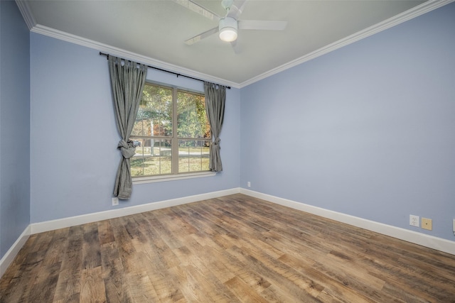 spare room with ceiling fan, wood-type flooring, and ornamental molding