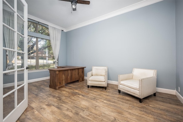 living area with hardwood / wood-style flooring, ceiling fan, crown molding, and french doors