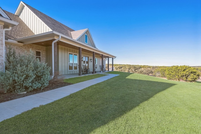 view of yard featuring a porch