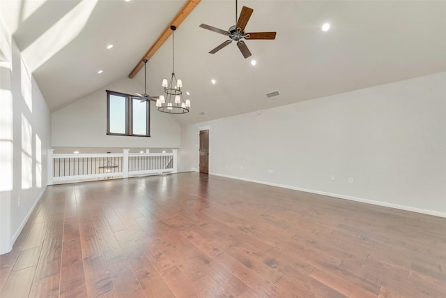 unfurnished living room featuring ceiling fan with notable chandelier, high vaulted ceiling, beam ceiling, and hardwood / wood-style floors