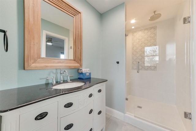 bathroom featuring vanity, tile patterned floors, and walk in shower