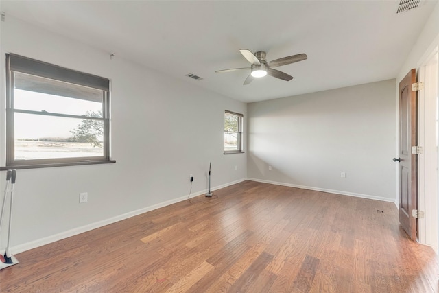 598 Dowell Rd, Rockwall, TX 75032 - empty room featuring a ceiling fan, light wood-style floors, and baseboards