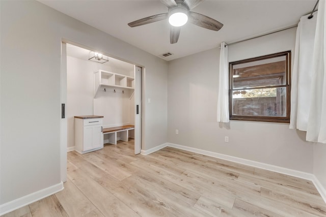 598 Dowell Rd, Rockwall, TX 75032 - unfurnished bedroom featuring light wood-style floors, baseboards, and a ceiling fan