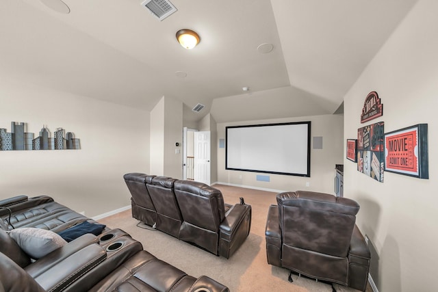 carpeted cinema with vaulted ceiling