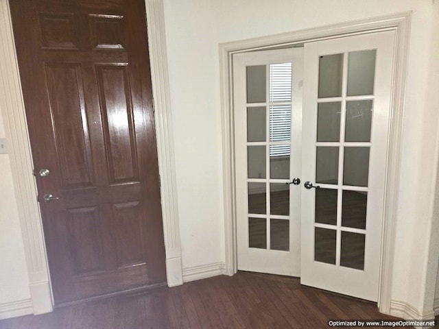 entryway featuring french doors and dark hardwood / wood-style floors