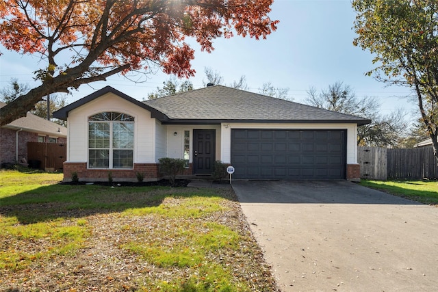 ranch-style home featuring a front yard and a garage