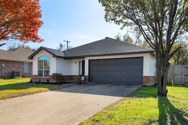 ranch-style house with a front lawn, cooling unit, and a garage