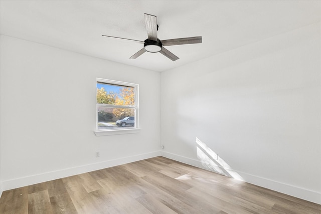 unfurnished room featuring light hardwood / wood-style floors and ceiling fan