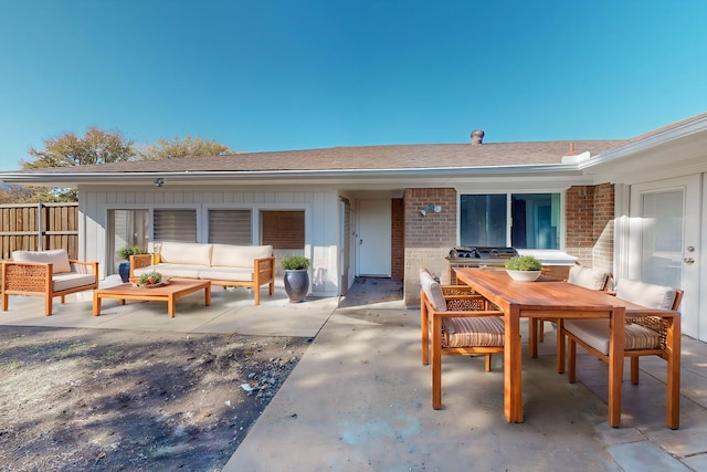 exterior space featuring an outdoor living space