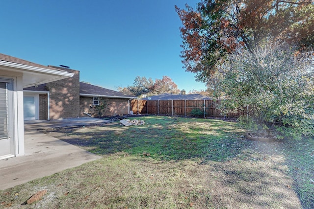 view of yard with a patio area