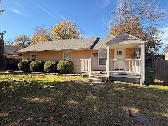 view of front facade with a porch and a front lawn