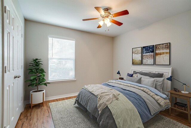 kitchen featuring light hardwood / wood-style flooring, ceiling fan, and appliances with stainless steel finishes