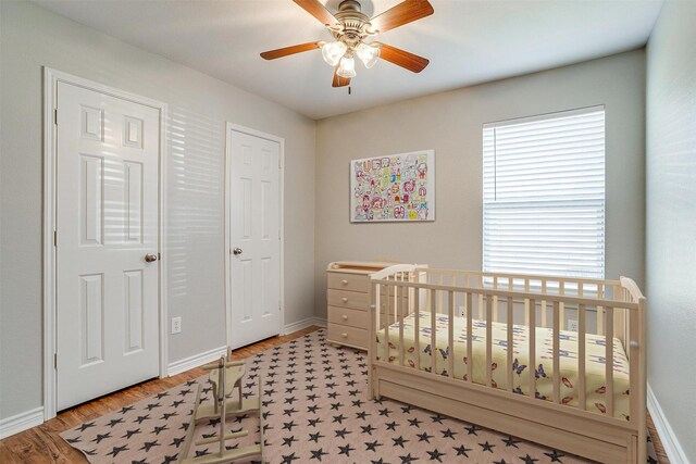 empty room featuring ceiling fan and light hardwood / wood-style flooring