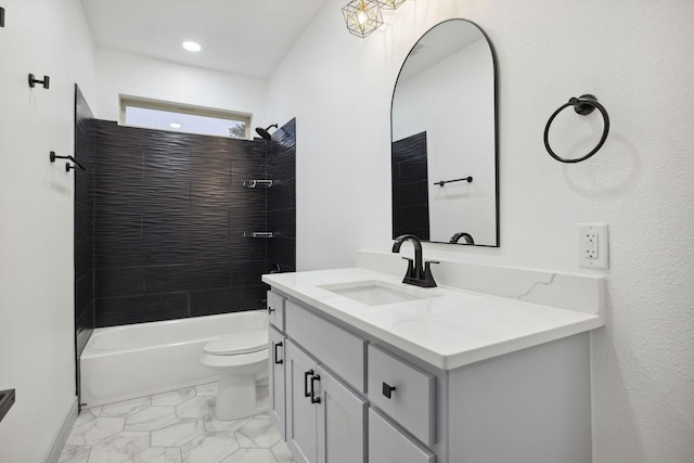 full bathroom with vanity, toilet, and tiled shower / bath combo