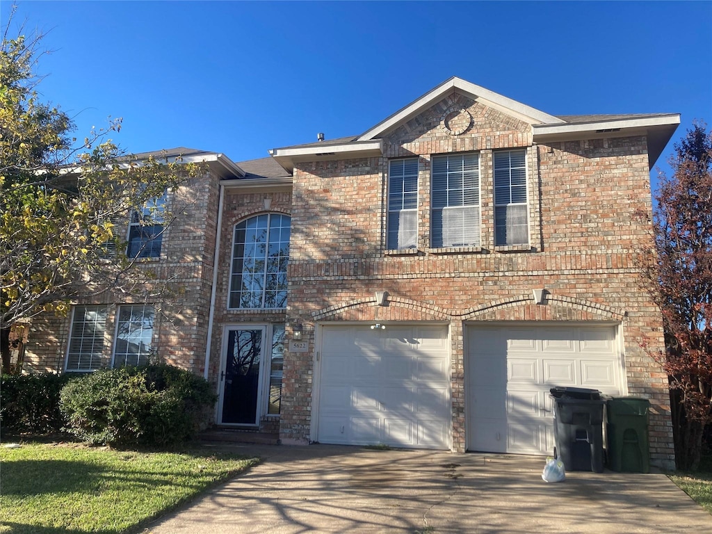 view of front property with a garage