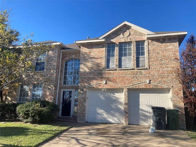 front of property with a garage