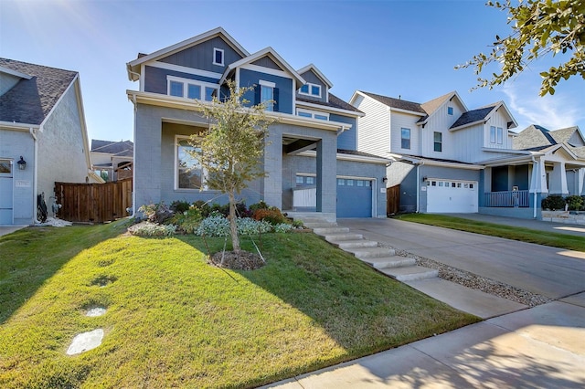 view of front of house featuring a garage and a front lawn