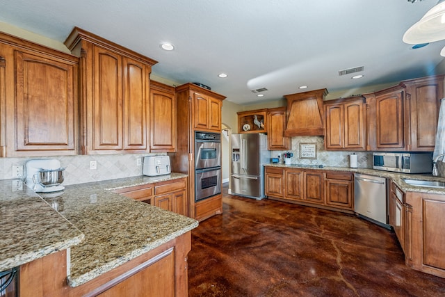 kitchen with custom range hood, backsplash, stainless steel appliances, and dark carpet