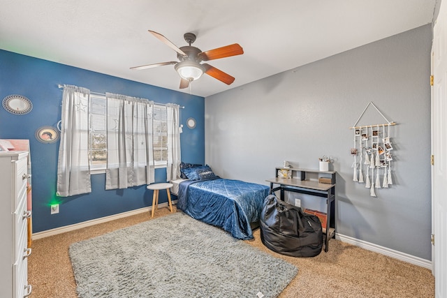 carpeted bedroom featuring ceiling fan