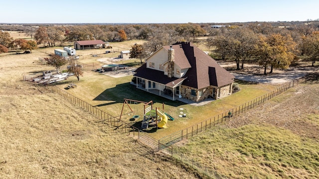 drone / aerial view with a rural view