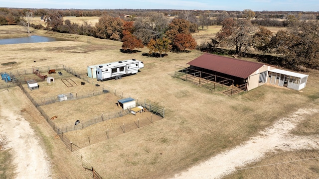 aerial view featuring a rural view and a water view