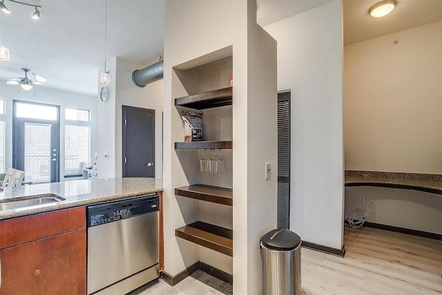 kitchen with dishwasher, light wood-type flooring, ceiling fan, and sink