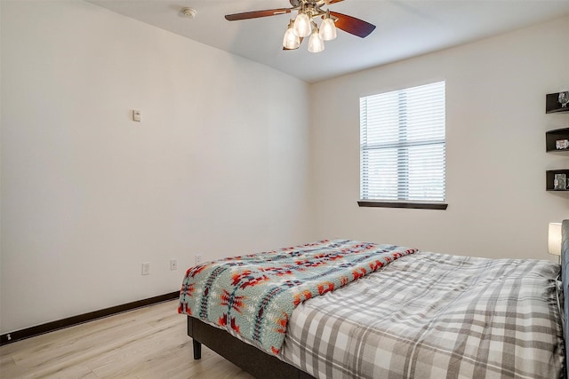 bedroom featuring ceiling fan and light hardwood / wood-style floors