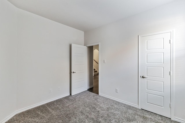 unfurnished bedroom featuring carpet floors