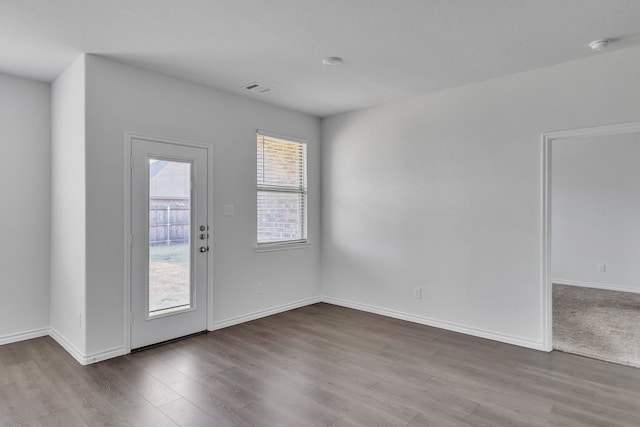 entryway with light hardwood / wood-style floors