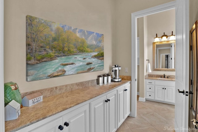 bathroom featuring vanity and tile patterned flooring