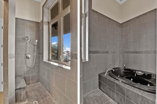 bathroom with separate shower and tub and tile walls