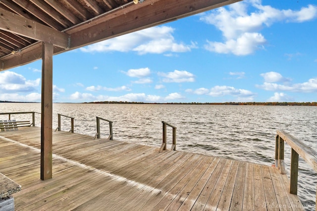 view of dock with a water view