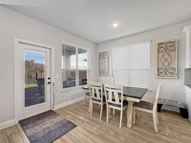 dining area with light wood-type flooring