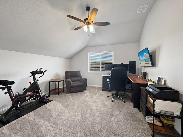 carpeted office space featuring ceiling fan and lofted ceiling