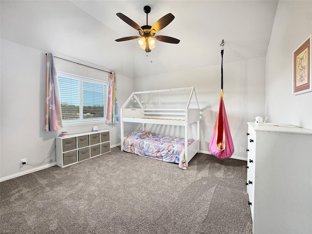 bedroom with ceiling fan and dark colored carpet