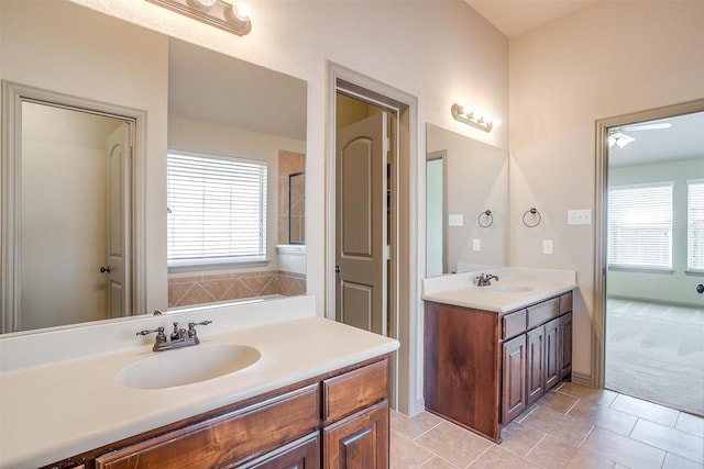 bathroom featuring tile patterned flooring and vanity