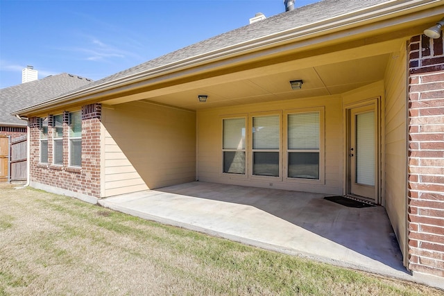 doorway to property featuring a patio