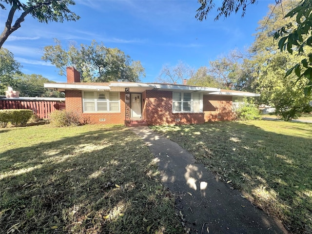 single story home with a front lawn