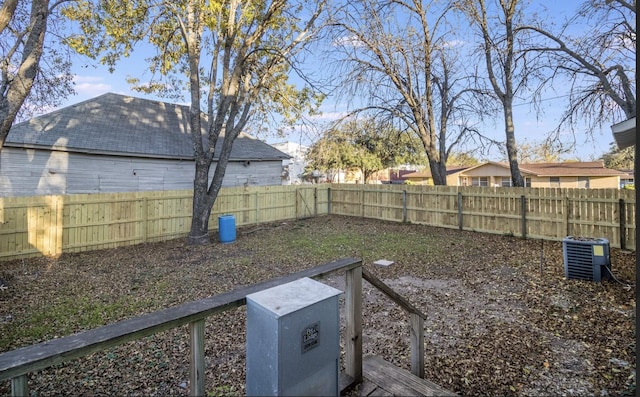 view of yard with central air condition unit