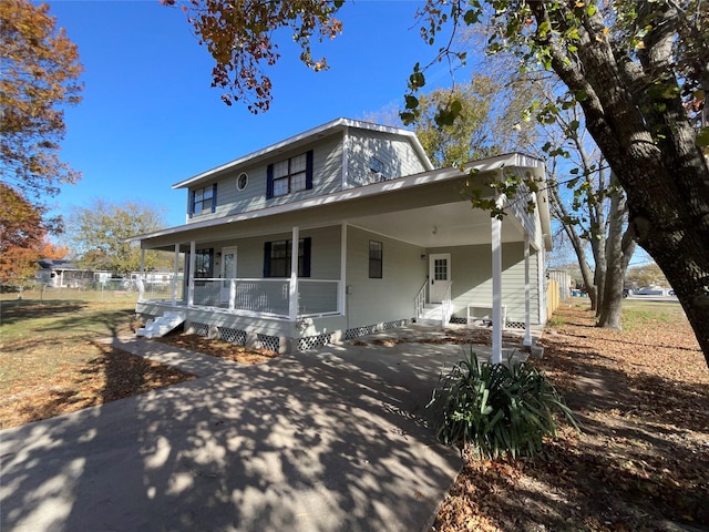 view of front facade with a carport