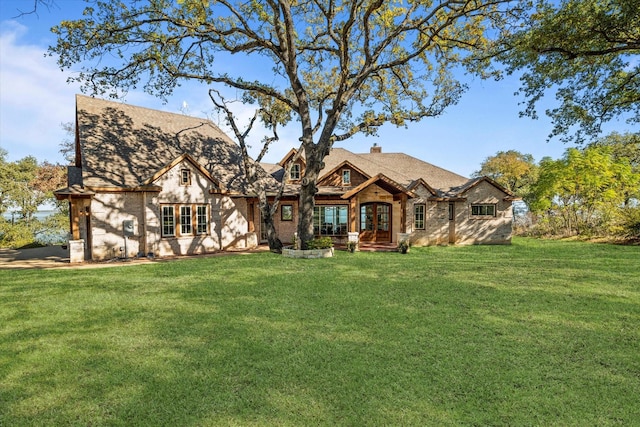 view of front of home with a front lawn