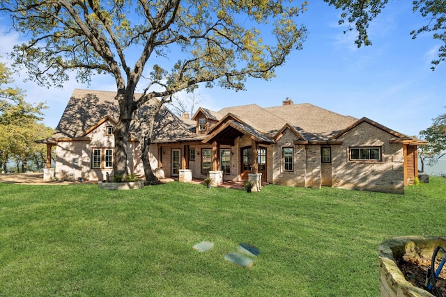 view of front of property with a front lawn