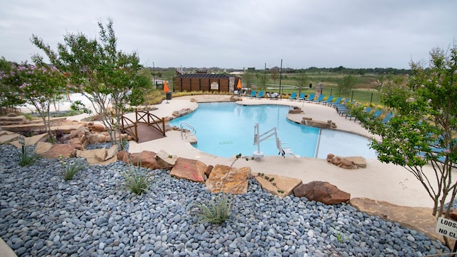 view of pool featuring a patio area