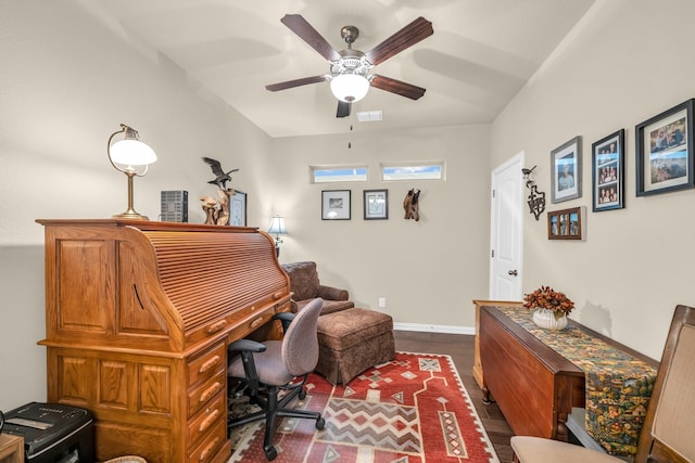 office space featuring ceiling fan and dark hardwood / wood-style flooring