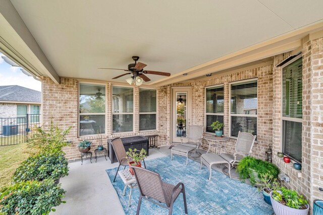 view of patio with ceiling fan