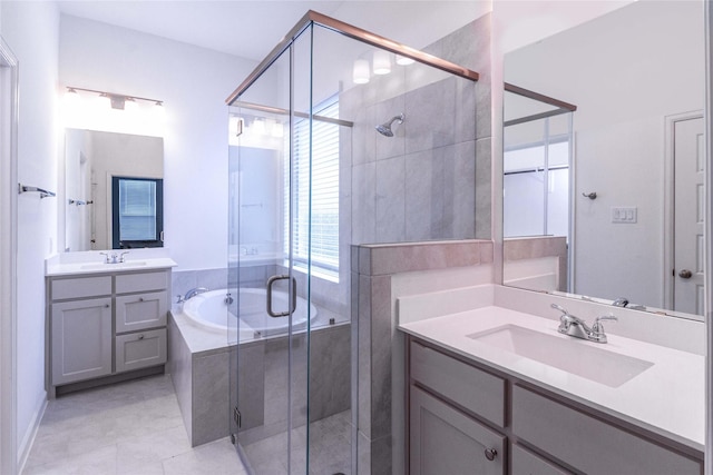 bathroom with plus walk in shower, vanity, and tile patterned floors