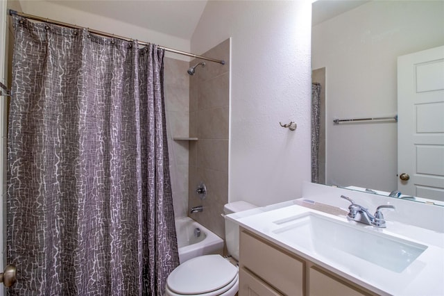 full bathroom with vanity, toilet, shower / tub combo, and vaulted ceiling