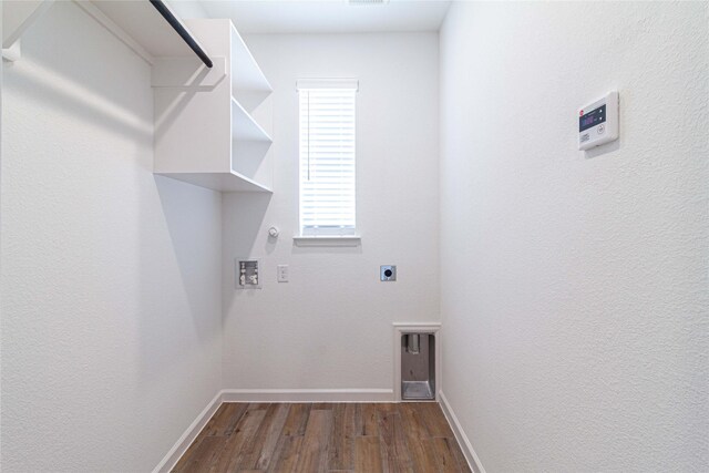 washroom with hookup for an electric dryer, hookup for a washing machine, hookup for a gas dryer, and dark wood-type flooring