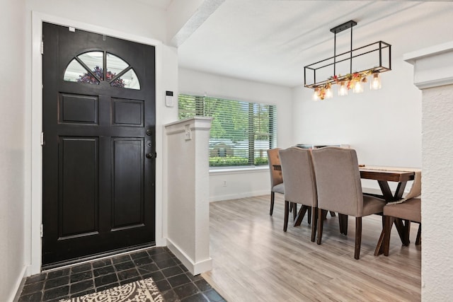 foyer with wood-type flooring