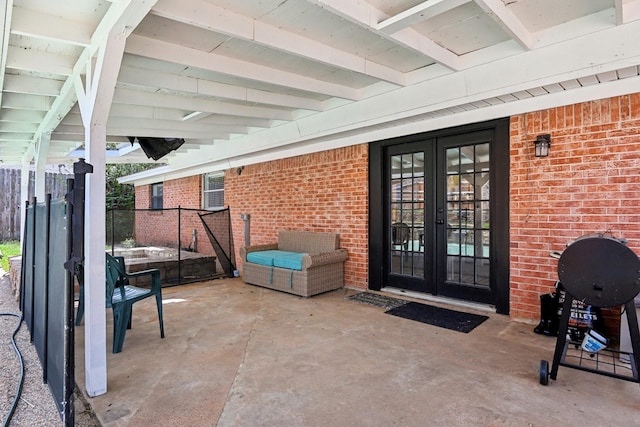 view of patio / terrace featuring french doors